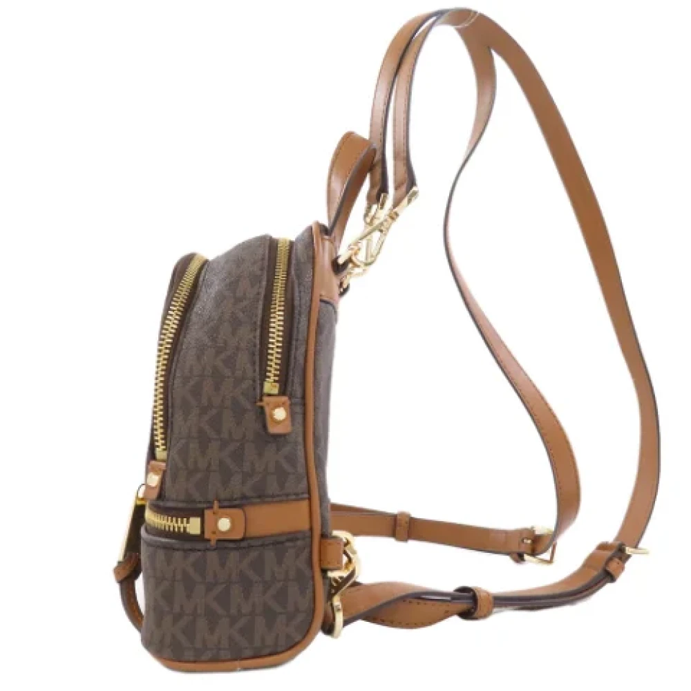 Michael Kors Pre-owned Plastic backpacks Brown Dames