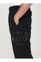 logo-brode-pantalons-noirs-elegants