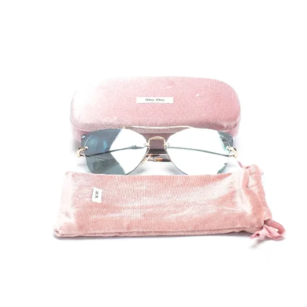 Miu Pre-owned Plastic sunglasses Yellow Dames