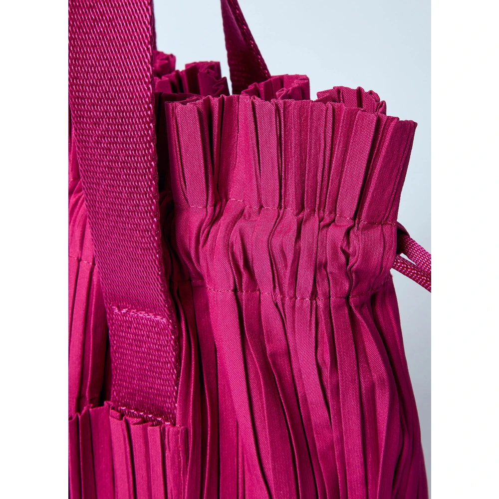 Issey Miyake Geplooide Handtas Pink Dames