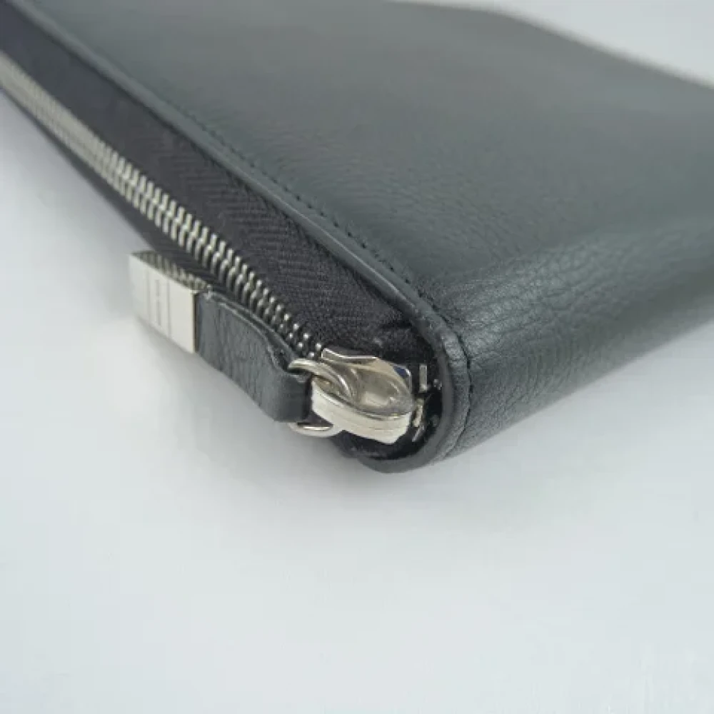 Dior Vintage Pre-owned Leather clutches Black Dames