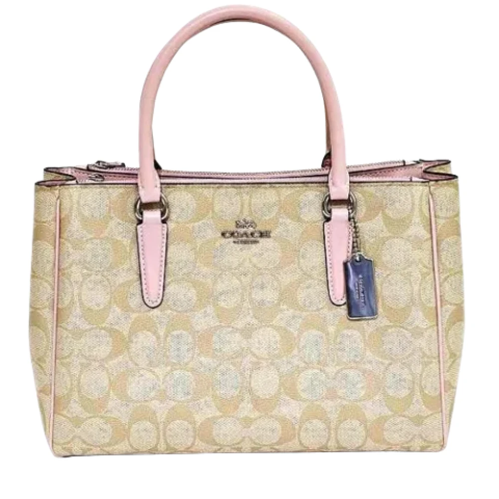 Coach Pre-owned Plastic handbags Beige Dames