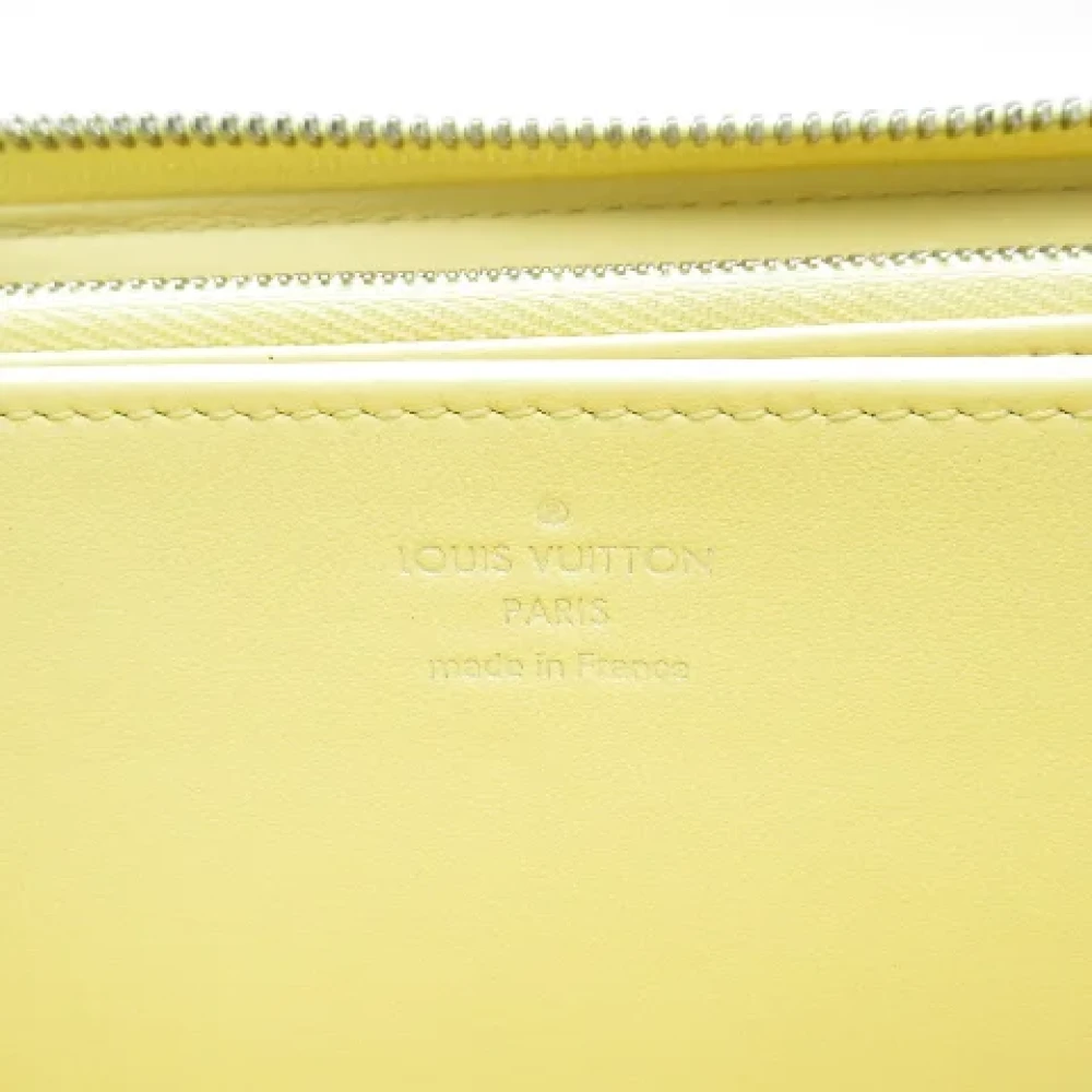 Louis Vuitton Vintage Pre-owned Leather wallets Yellow Dames