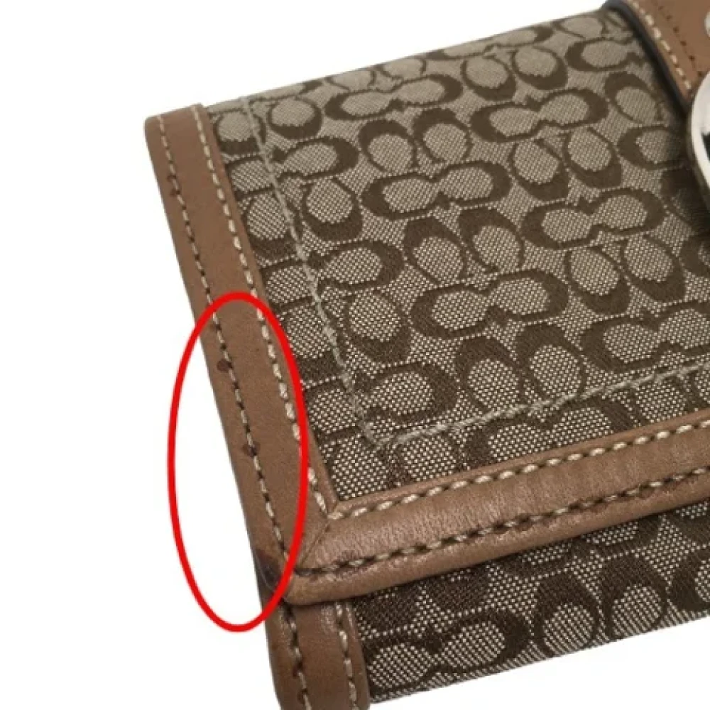 Coach Pre-owned Fabric clutches Brown Dames