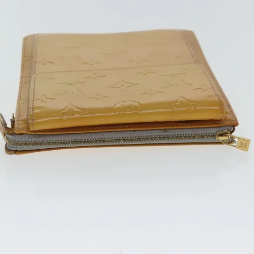 Louis Vuitton Vintage Pre-owned Leather pouches Yellow Dames