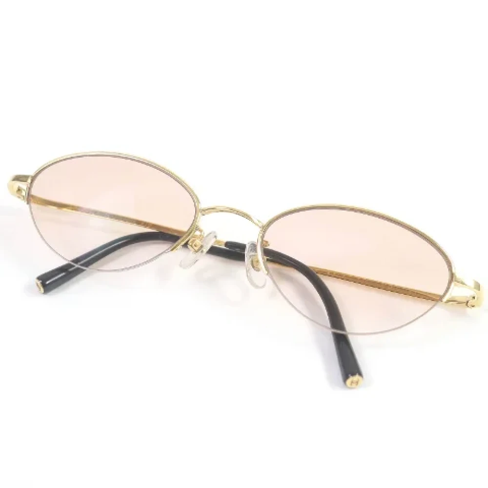 Chanel Vintage Pre-owned Metal sunglasses Yellow Dames