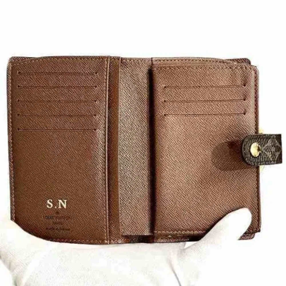 Louis Vuitton Vintage Pre-owned Fabric wallets Brown Dames