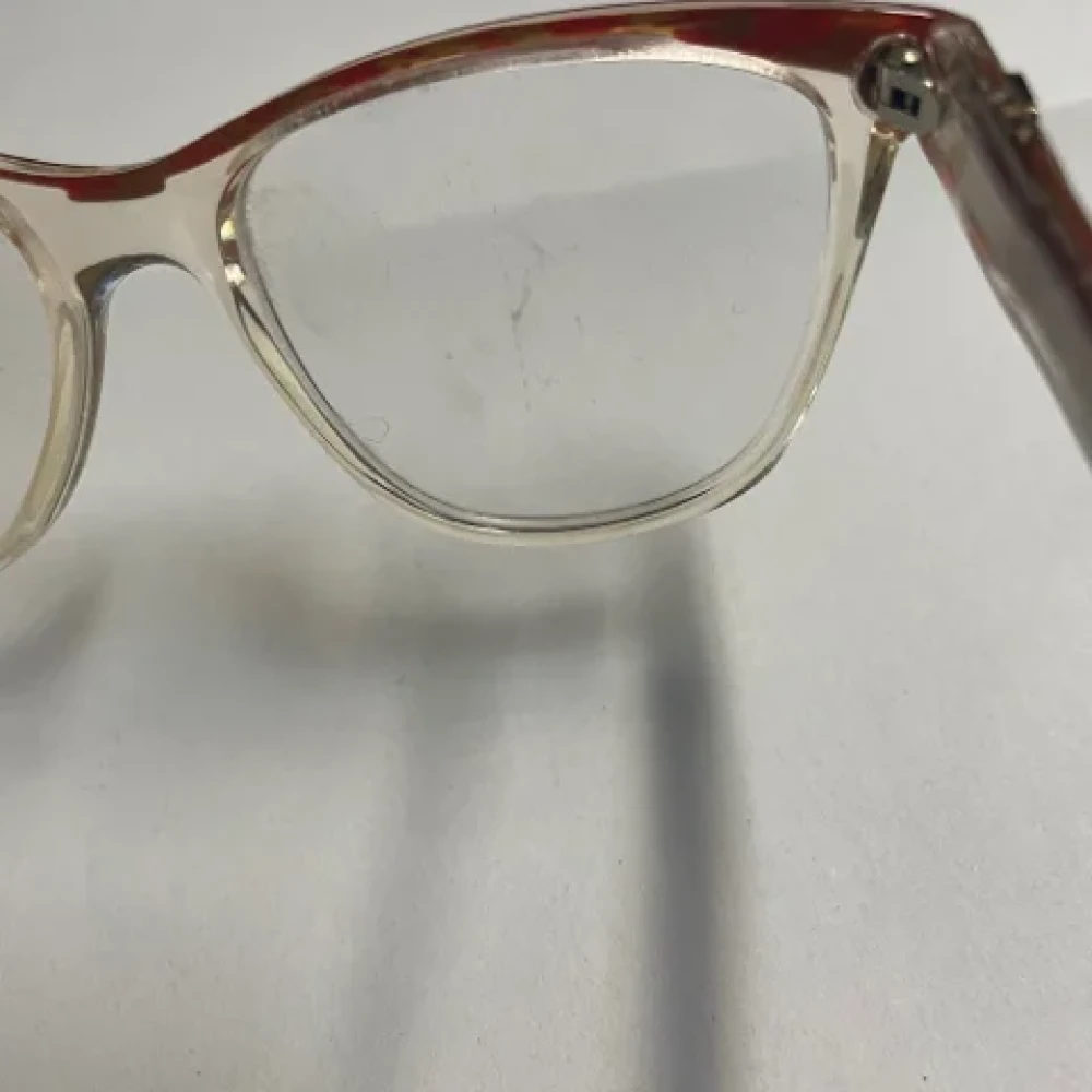 Yves Saint Laurent Vintage Pre-owned Acetate sunglasses Orange Dames