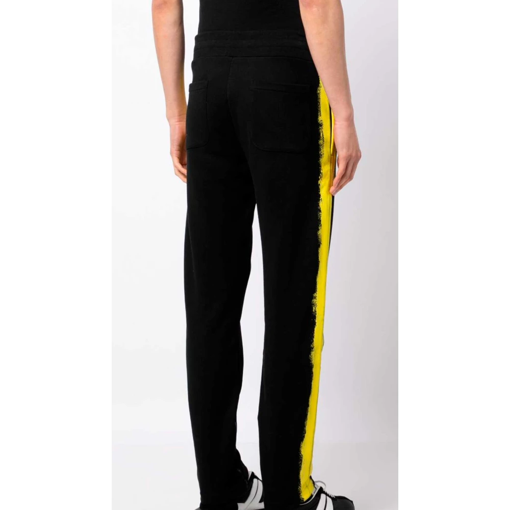 Moschino Zwarte sweatpants met gele verfeffect Black Heren