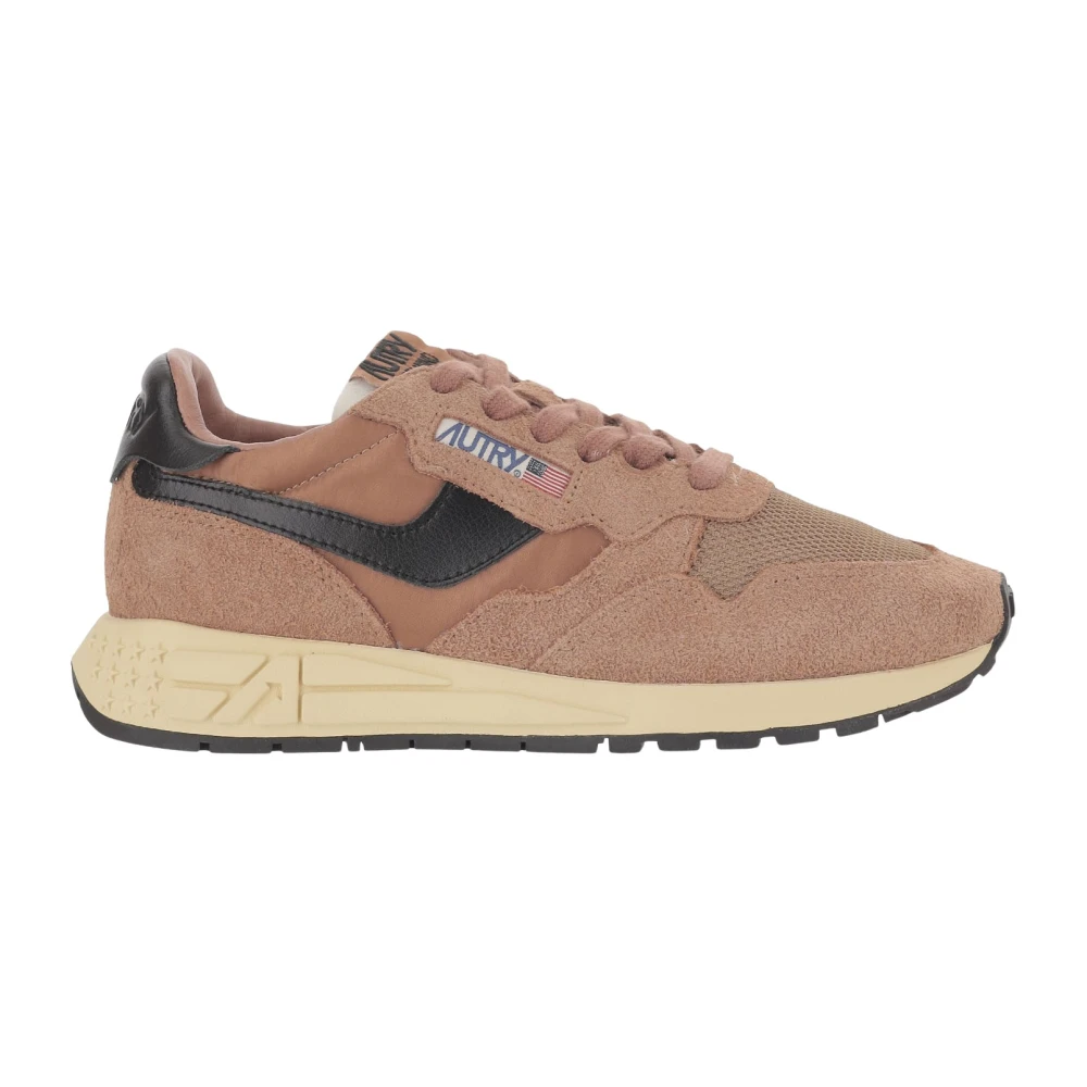 Autry Sneakers made from a leather blend Front lacing Round toe Logo details Tone-on-tone stitching Rubber running sole Contrast padded heel Made in Indonesia Composition: 50% nylon- 40% leather- 10% mesh Dames Schoenen Bruin