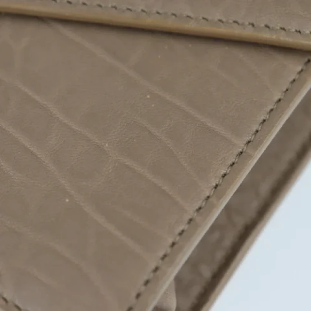 Jimmy Choo Pre-owned Leather clutches Beige Dames