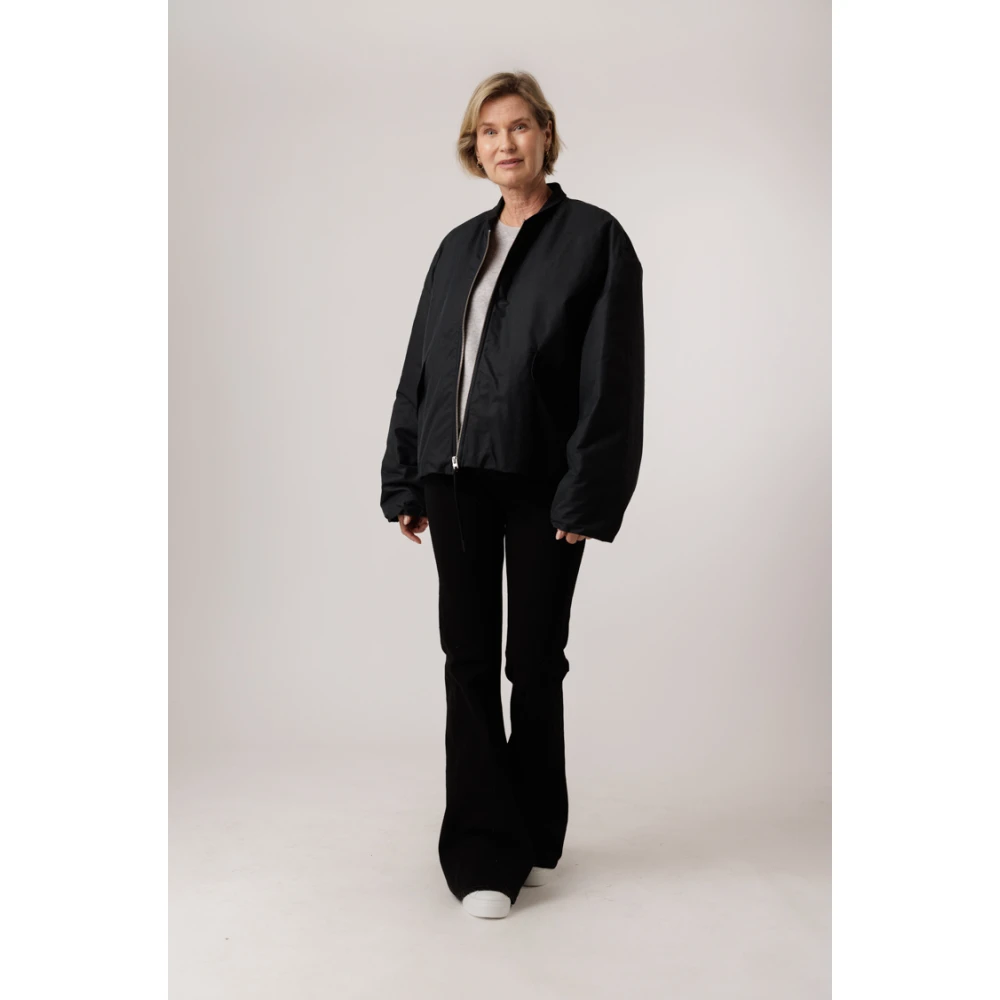 closed Blauwe waterafstotende jas met gebreide manchetten Blue Dames