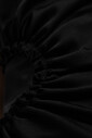 robe-avec-drape-decoratif