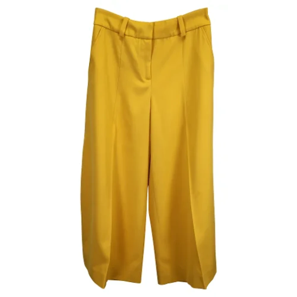 Oscar De La Renta Pre-owned Polyester bottoms Yellow Dames