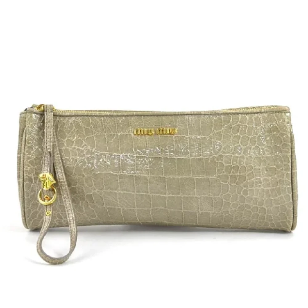 Miu Pre-owned Fabric clutches Beige Dames