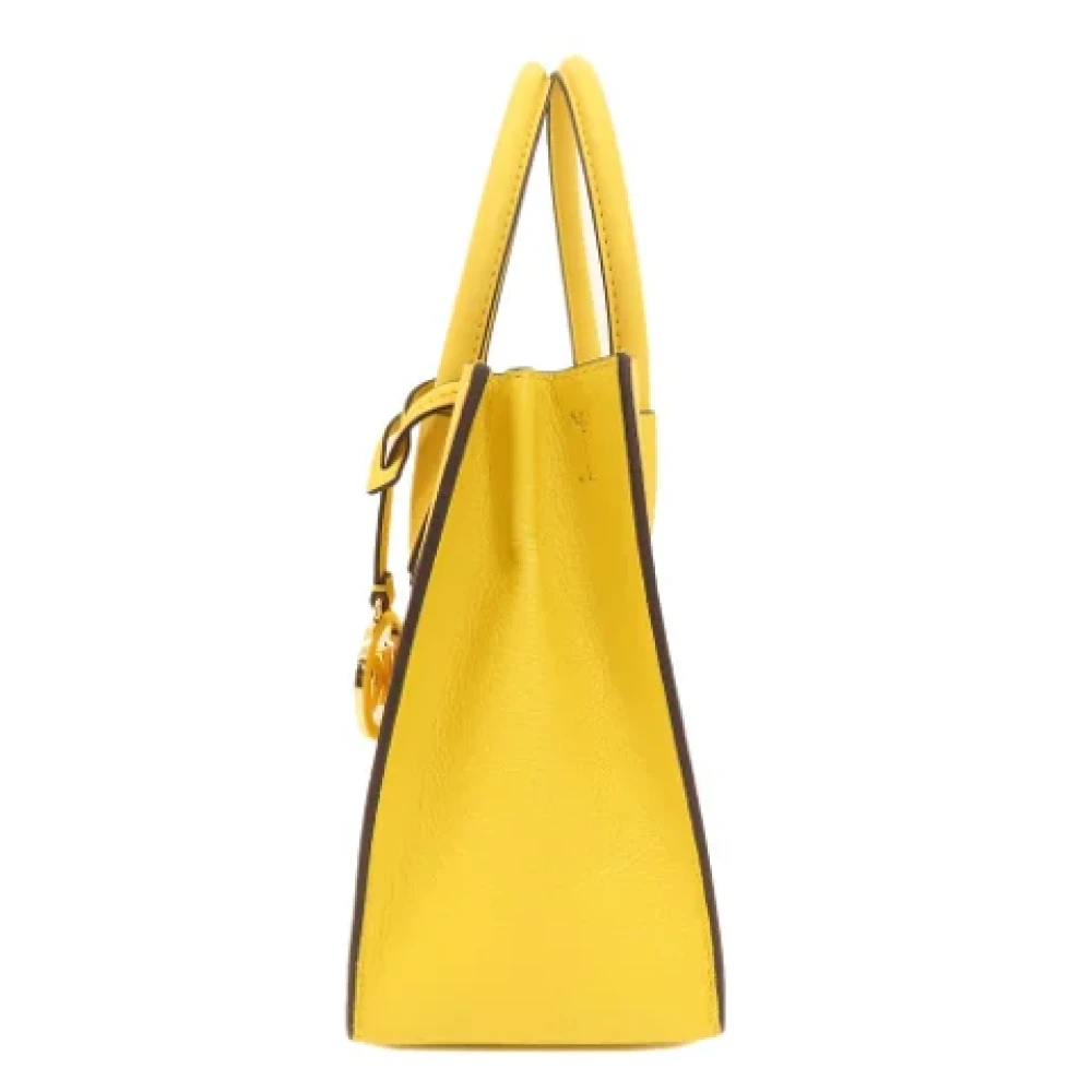 Michael Kors Pre-owned Fabric handbags Yellow Dames