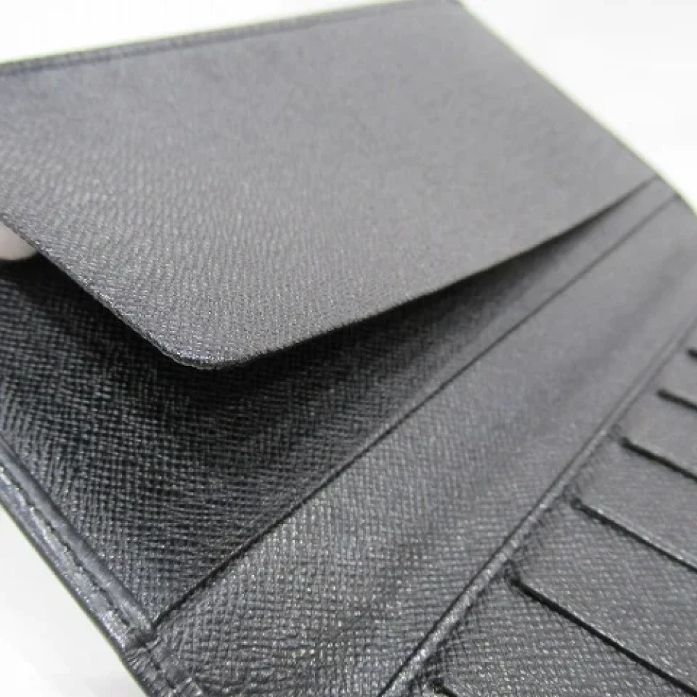 Louis Vuitton Vintage Pre-owned Leather wallets Black Heren
