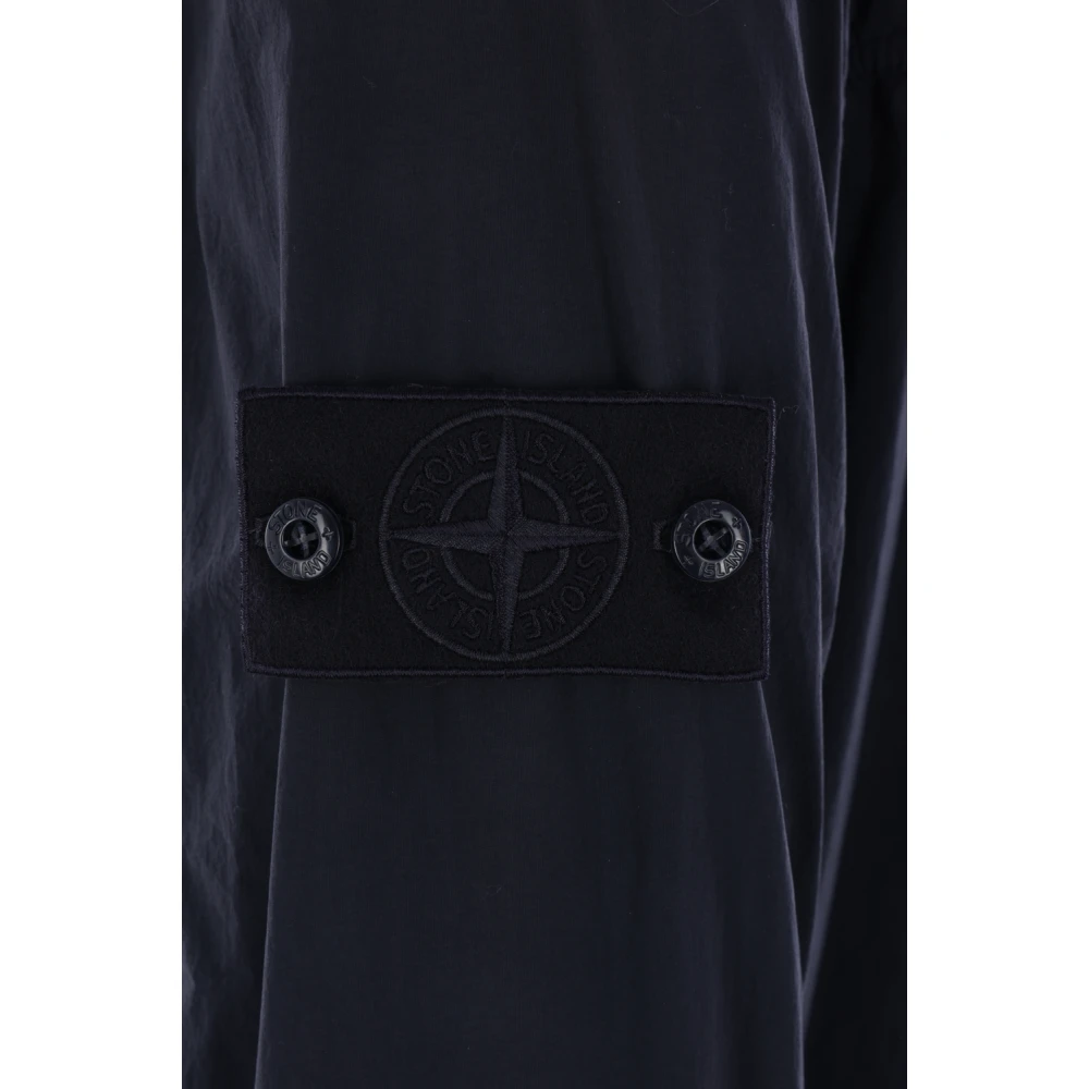 Stone Island Blauwe windjack met capuchon Blue Heren