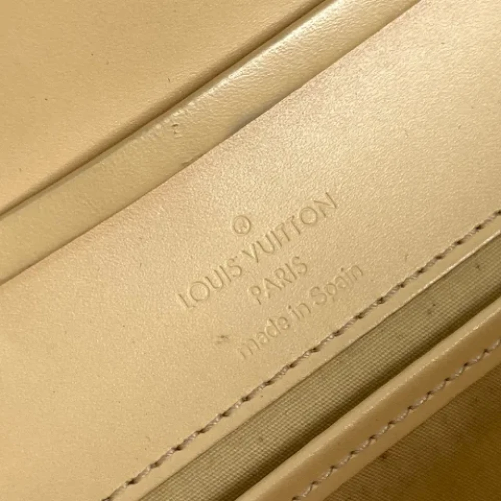 Louis Vuitton Vintage Pre-owned Leather clutches Yellow Dames