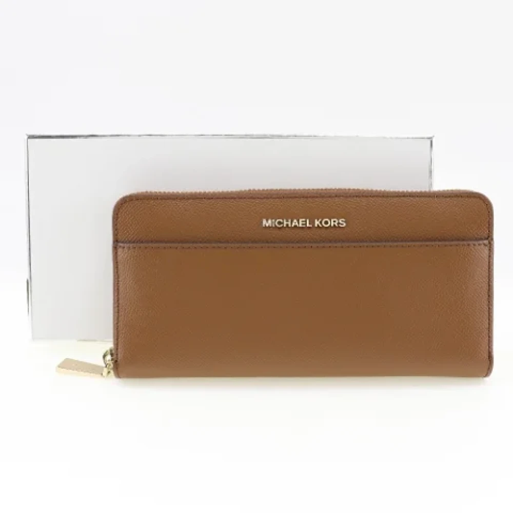 Michael Kors Pre-owned Leather wallets Brown Dames