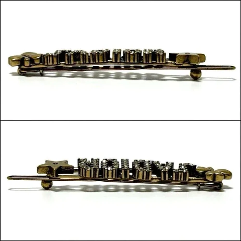 Dior Vintage Pre-owned Metal hair-accessories Yellow Dames