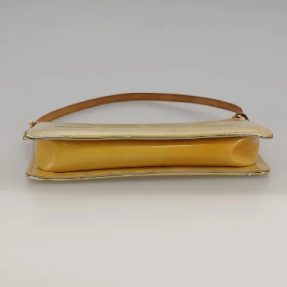 Louis Vuitton Vintage Pre-owned Leather pouches Beige Dames