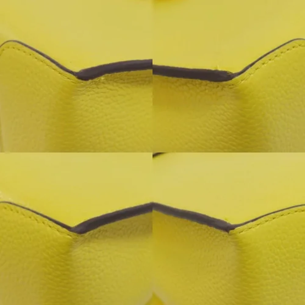 Michael Kors Pre-owned Plastic handbags Yellow Dames