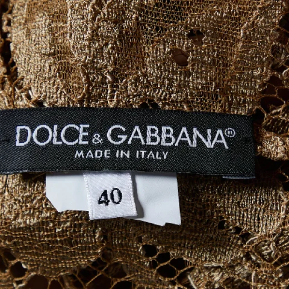 Dolce & Gabbana Pre-owned Lace tops Yellow Dames