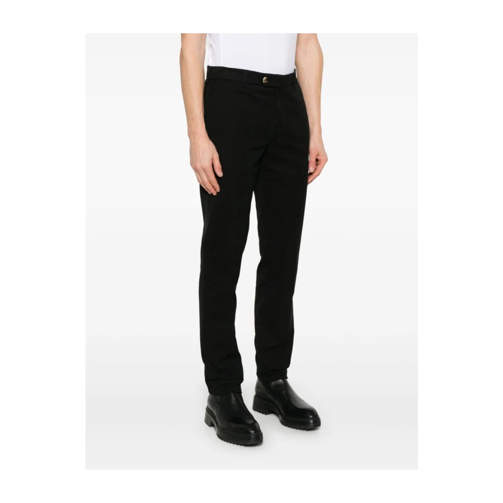 BRUNELLO CUCINELLI Zwarte broek met knoopsluiting Black Heren