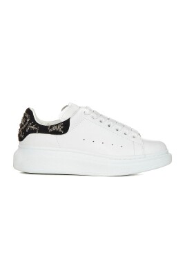 white-sneakers-with-graffiti-accents