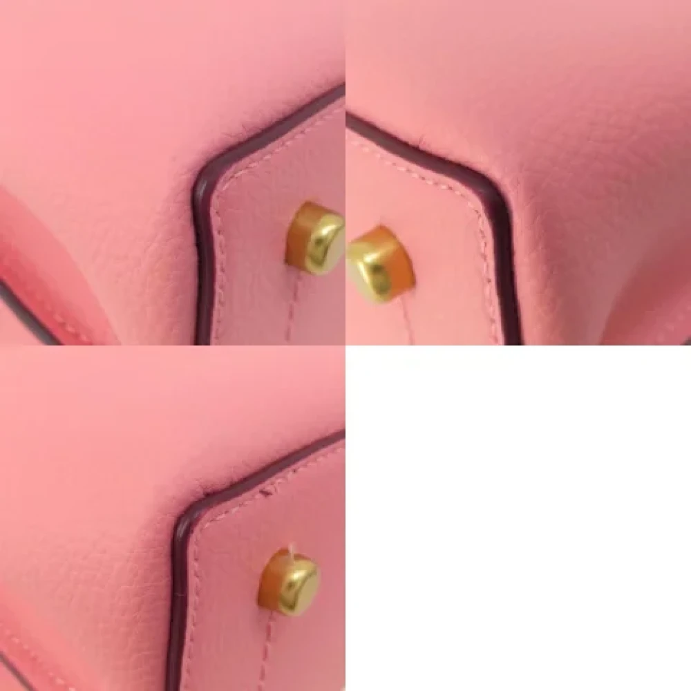 Coach Pre-owned Fabric handbags Pink Dames