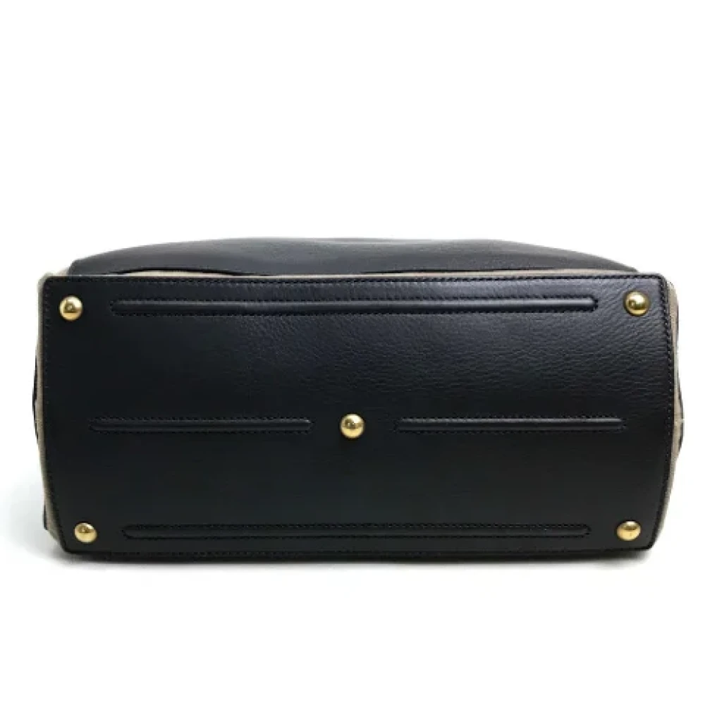 Yves Saint Laurent Vintage Pre-owned Cotton handbags Black Dames