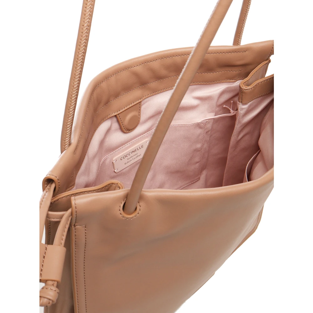 Coccinelle Nude Schoudertas met Trekkoordsluiting Beige Dames
