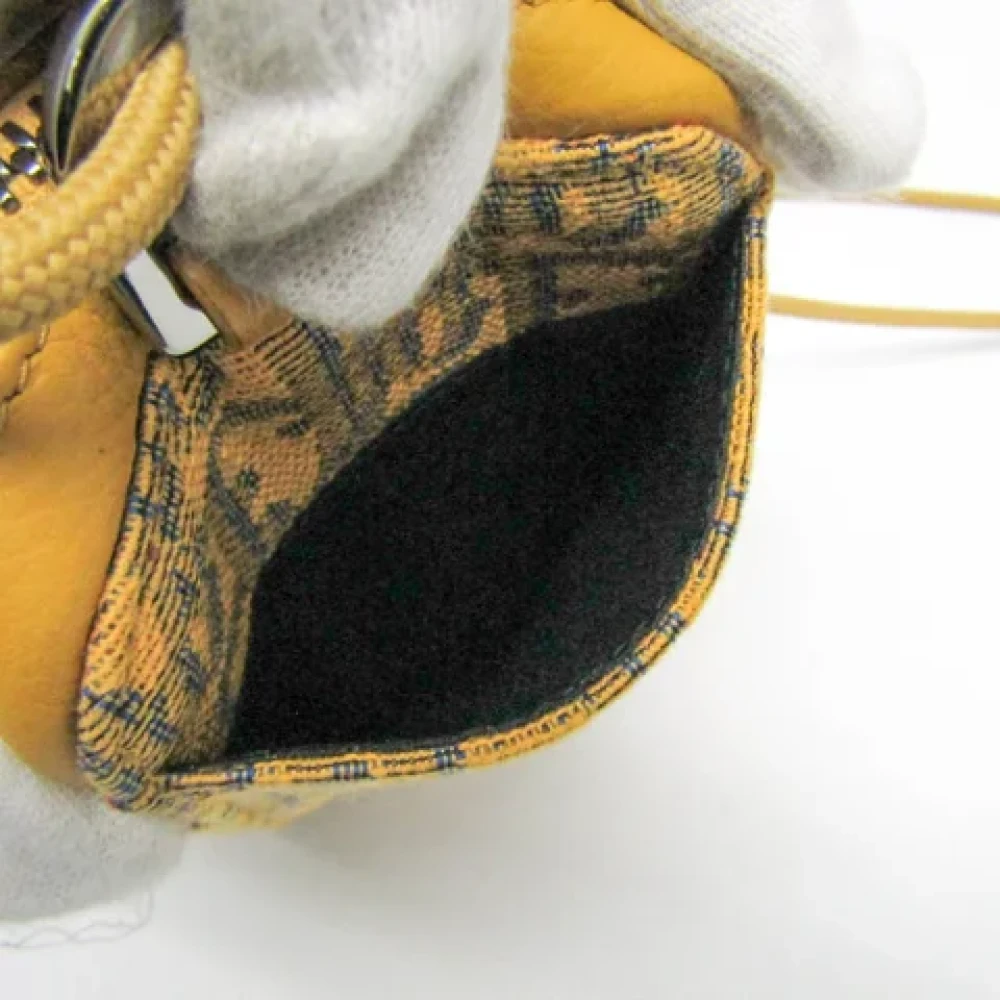 Dior Vintage Pre-owned Leather pouches Yellow Dames
