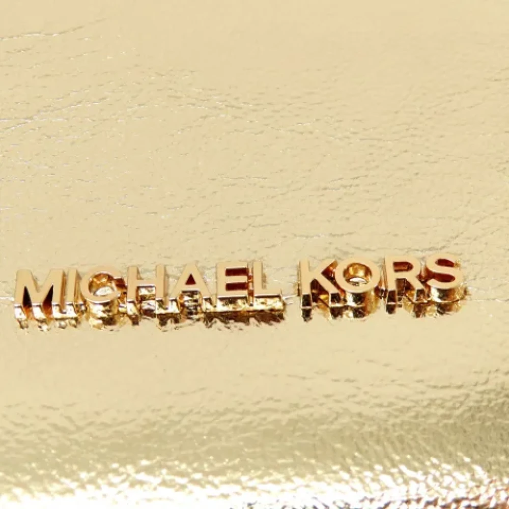 Michael Kors Pre-owned Plastic handbags Yellow Dames