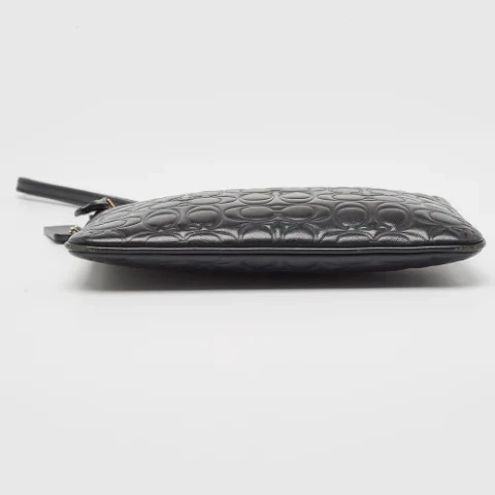 Coach Pre-owned Leather clutches Black Dames