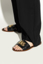 mules-en-cuir-avec-une-application-en-forme-de-logo