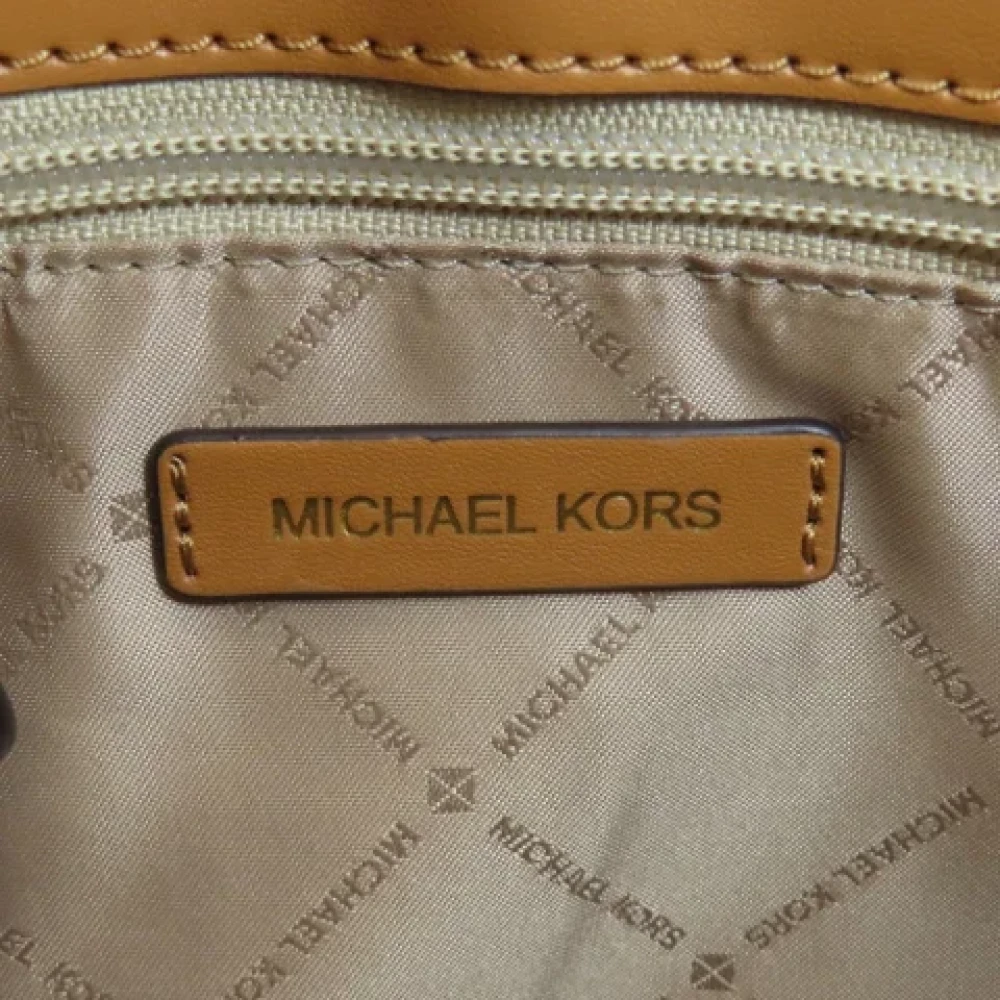 Michael Kors Pre-owned Plastic handbags Brown Dames