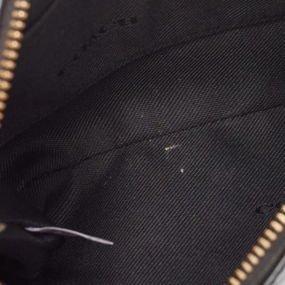 Coach Pre-owned Leather clutches Black Dames