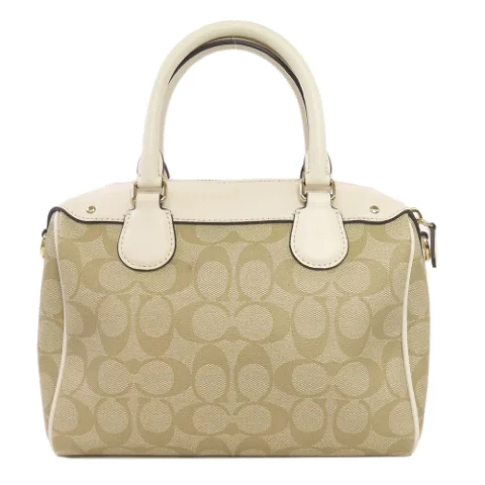 Coach Pre-owned Plastic handbags Beige Dames
