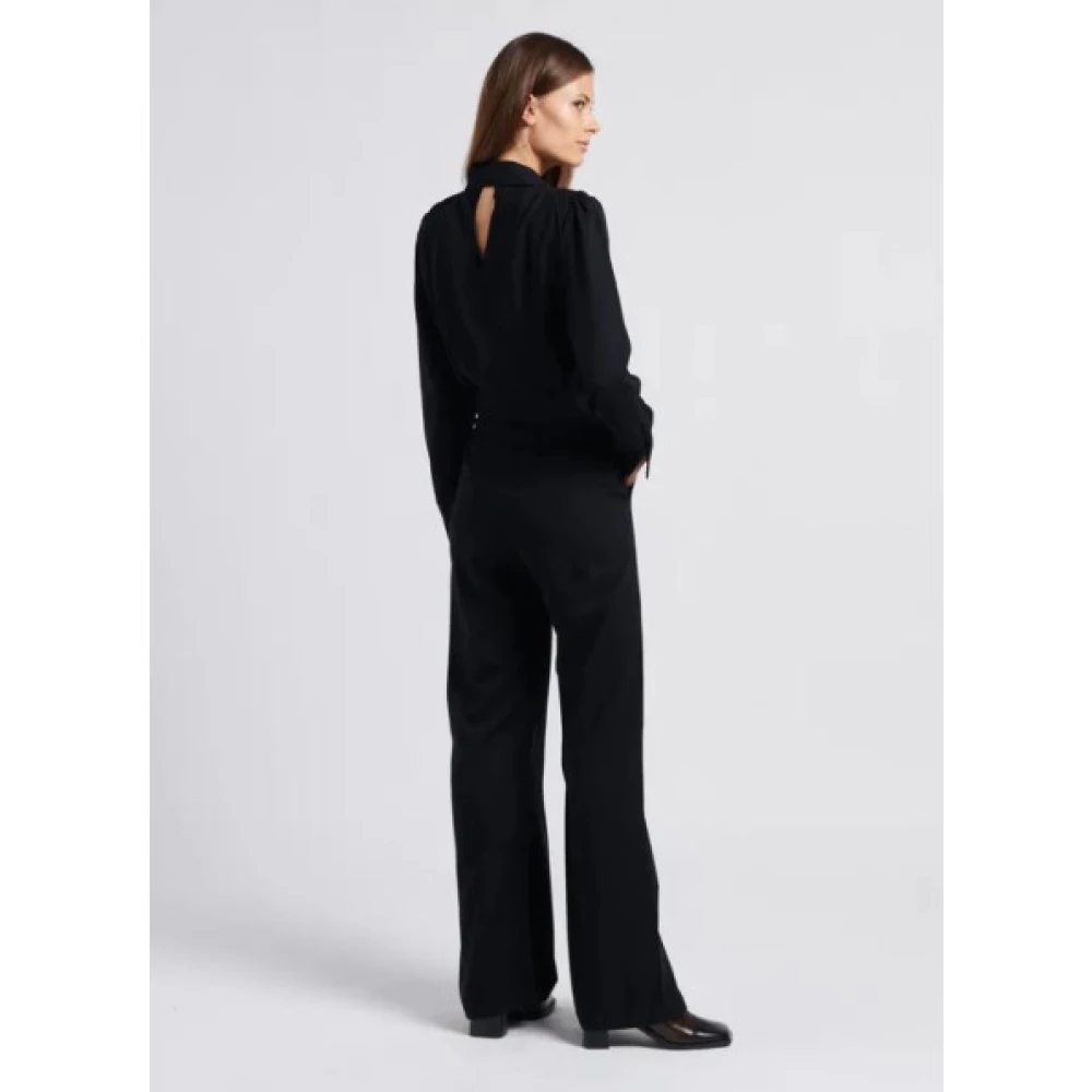 Suncoo Jumpsuit met V-hals en knoopdetails Black Dames