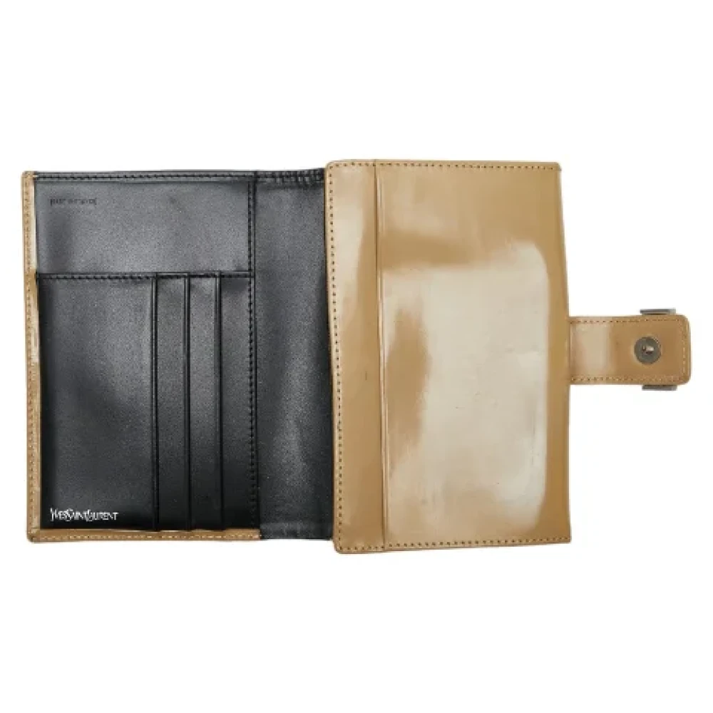 Yves Saint Laurent Vintage Pre-owned Leather wallets Beige Dames