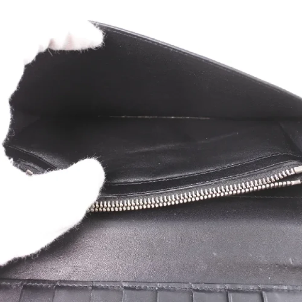 Yves Saint Laurent Vintage Pre-owned Leather wallets Black Heren