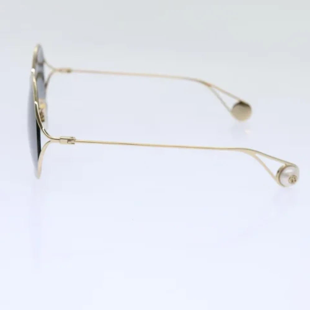 Gucci Vintage Pre-owned Metal sunglasses Yellow Dames