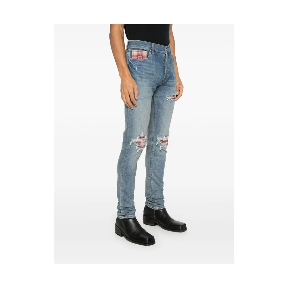 Amiri Lichtblauwe Ripped Jeans met knoopsluiting Blue Heren