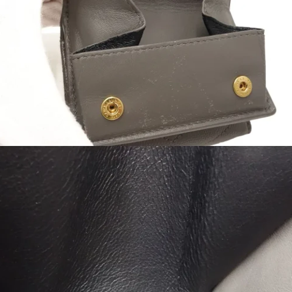 Yves Saint Laurent Vintage Pre-owned Leather wallets Gray Dames