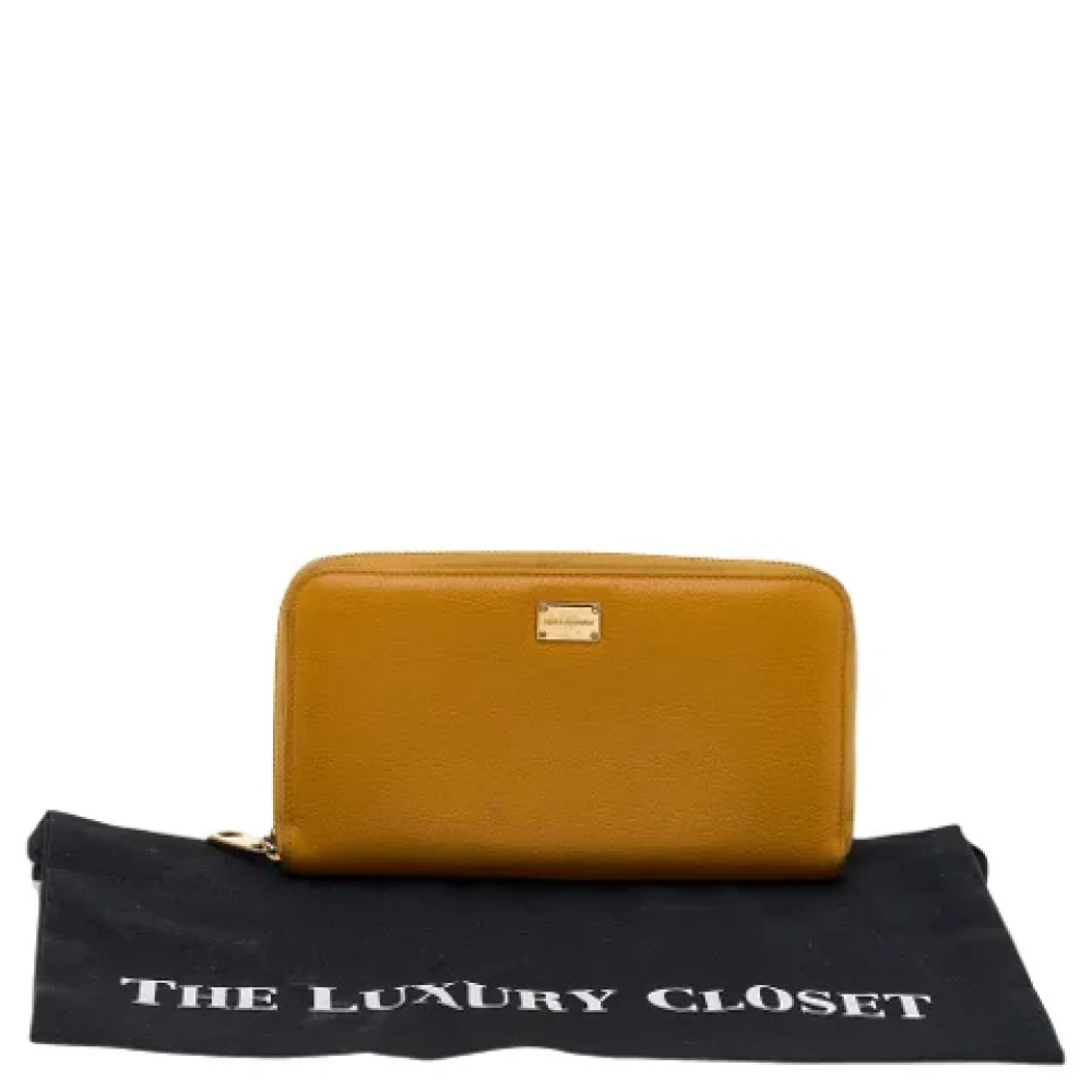 Dolce & Gabbana Pre-owned Leather wallets Yellow Dames