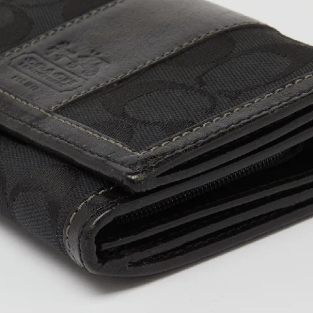 Coach Pre-owned Canvas wallets Black Dames
