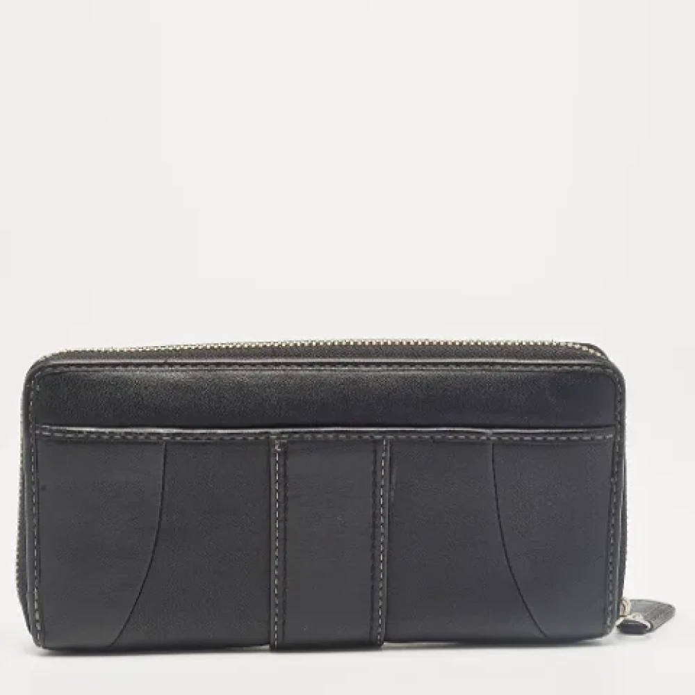 Coach Pre-owned Leather wallets Black Dames