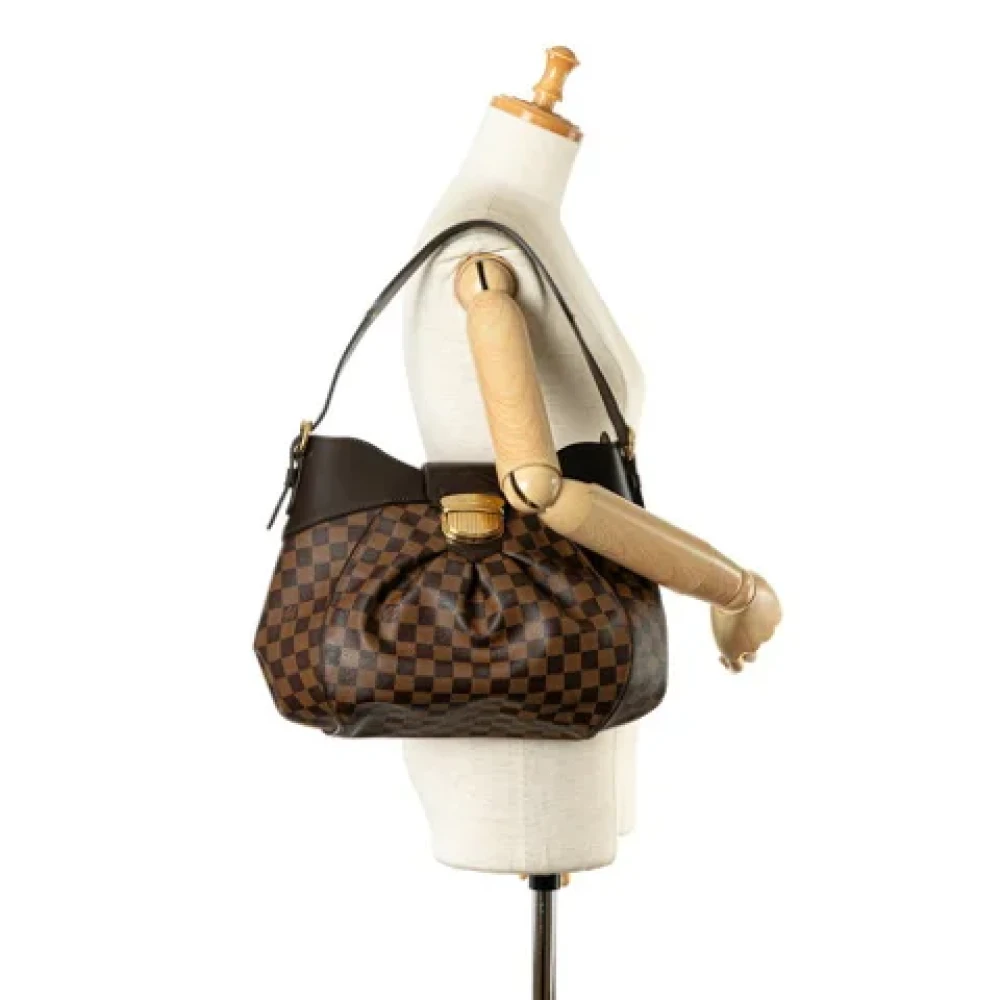Louis Vuitton Vintage Pre-owned Plastic shoulder-bags Brown Dames